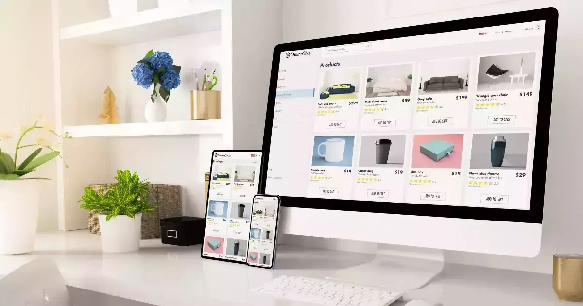 A desktop and smartphone display an online shop with various product listings, surrounded by houseplants and decorative items.